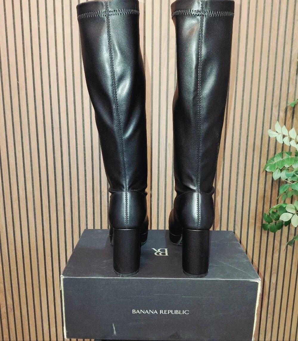 Black Platform Knee-High Boots Edgy Modern Mod